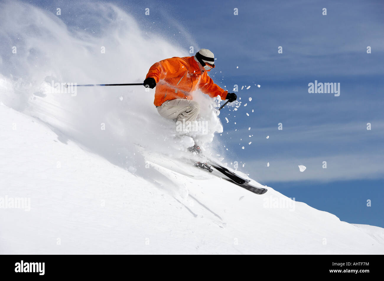 Austria, Saalbach, male skier jumping on slope Stock Photo