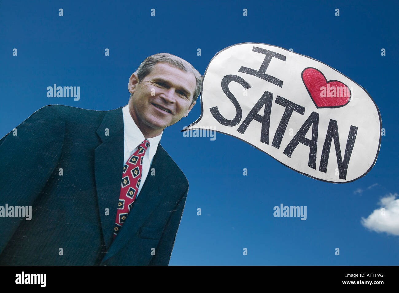 Picture of anti Bush political rally in Tucson AZ with a sign saying President George W Bush Loves Satan in Tucson AZ Stock Photo