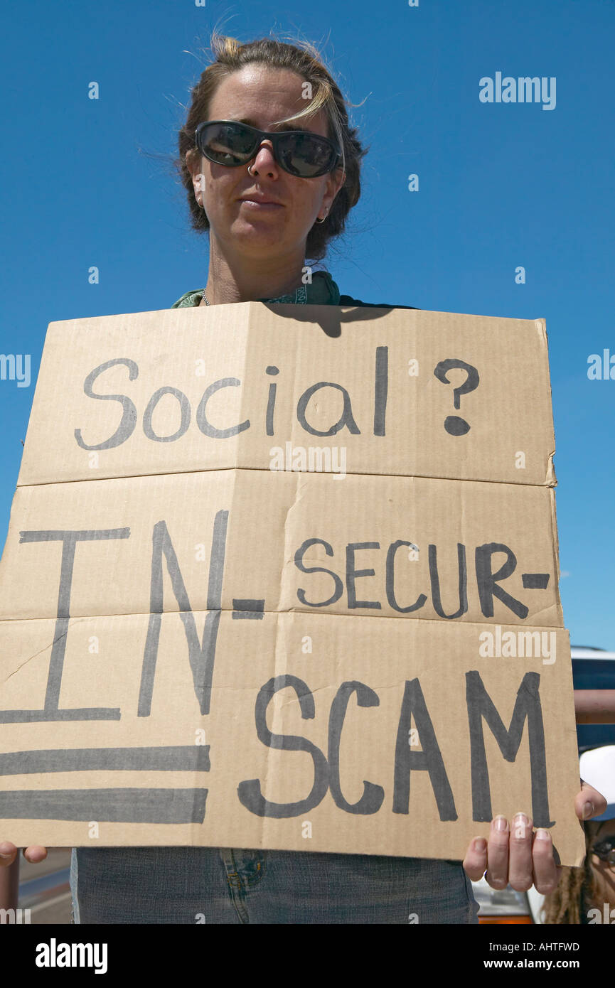 Protestor of President George W Bush holding a sign up protesting his Social Security plan in Tucson Arizona Stock Photo