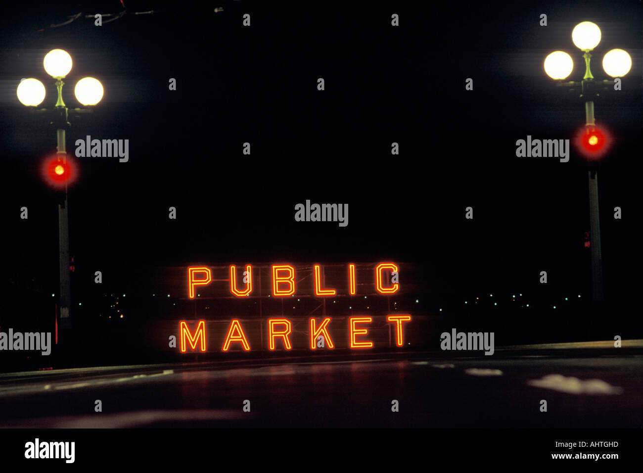 A neon sign that reads Public Market Stock Photo