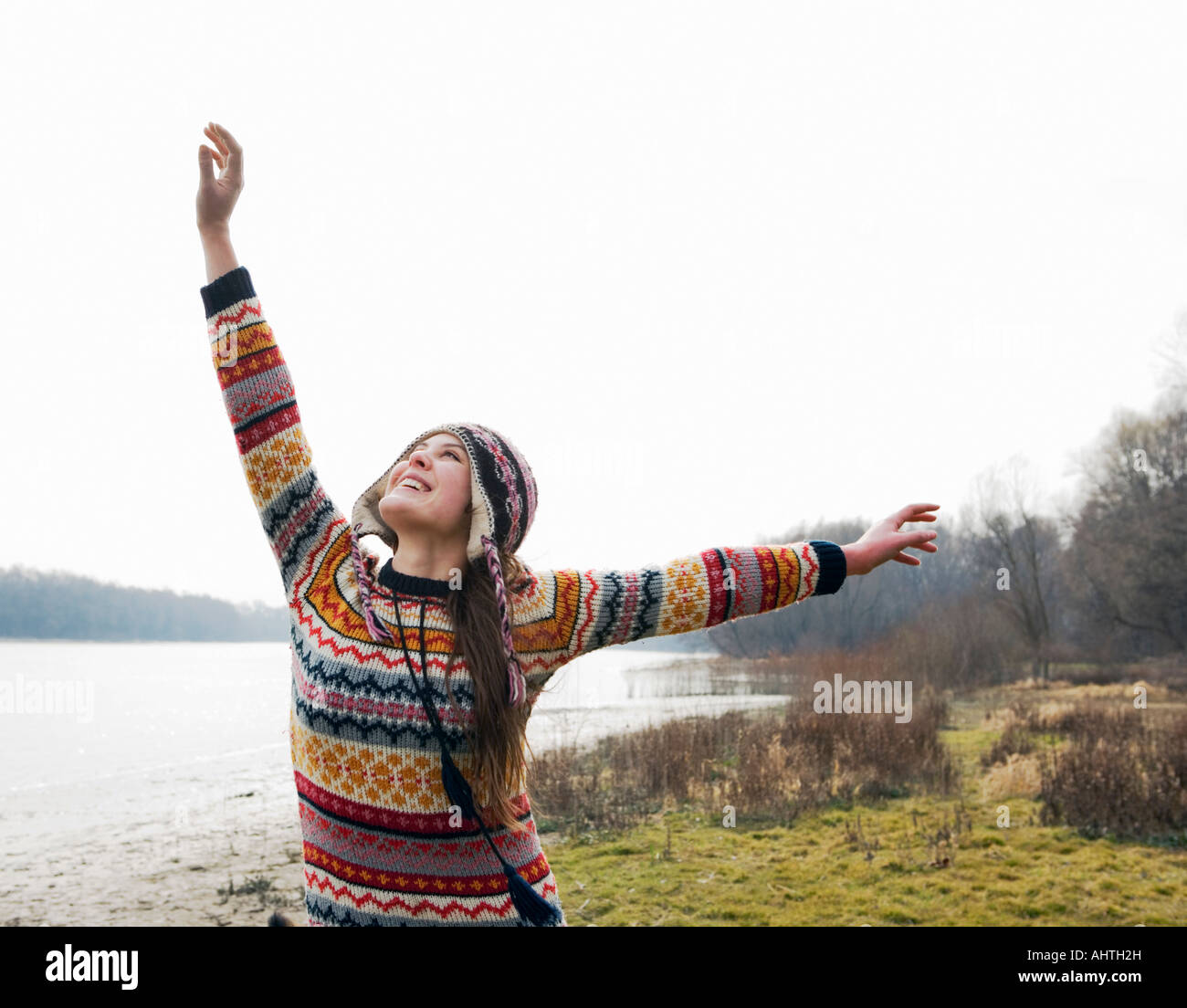 Woman standing by river hi-res stock photography and images - Alamy