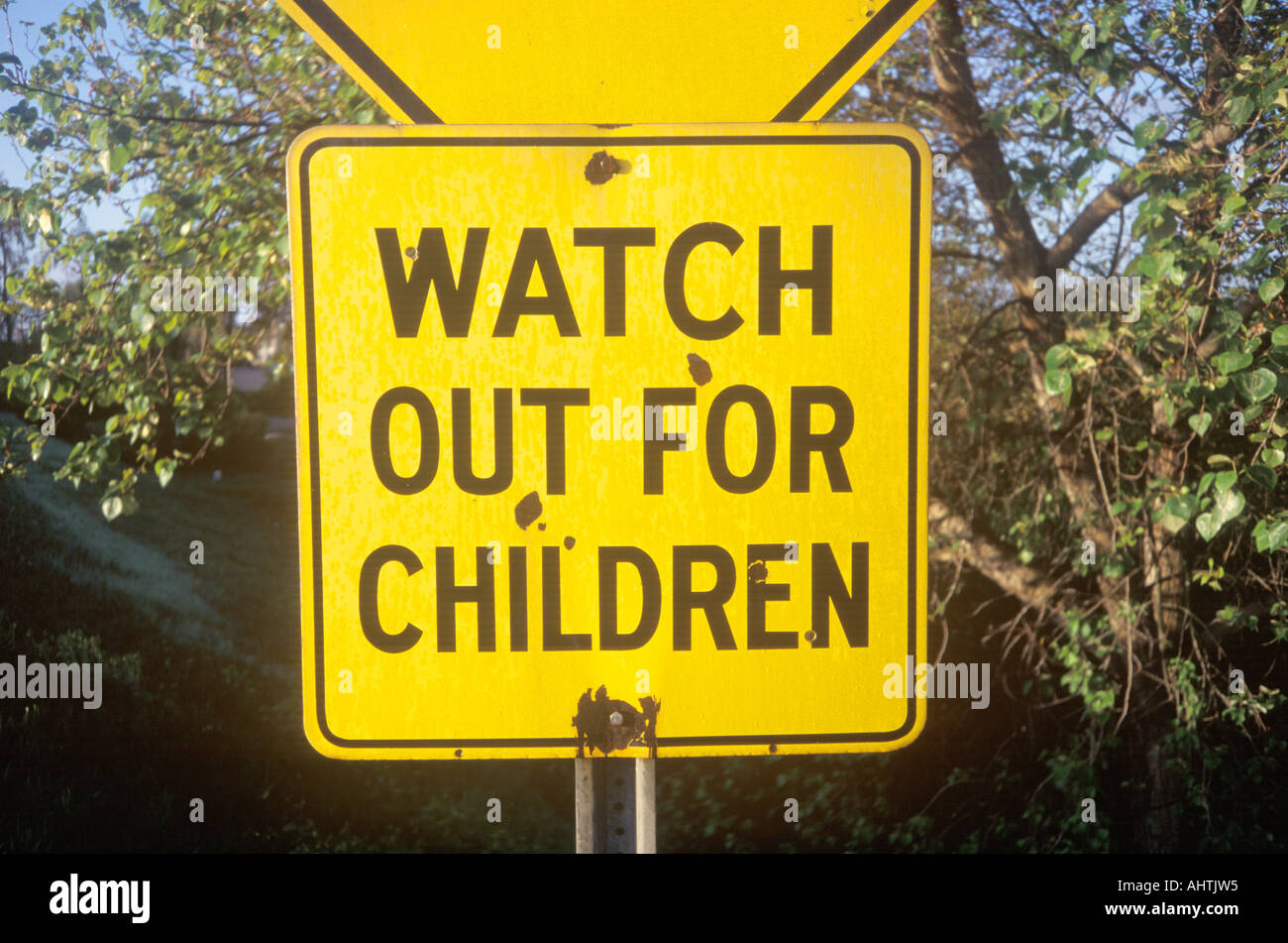 A sign that reads Watch out for children Stock Photo
