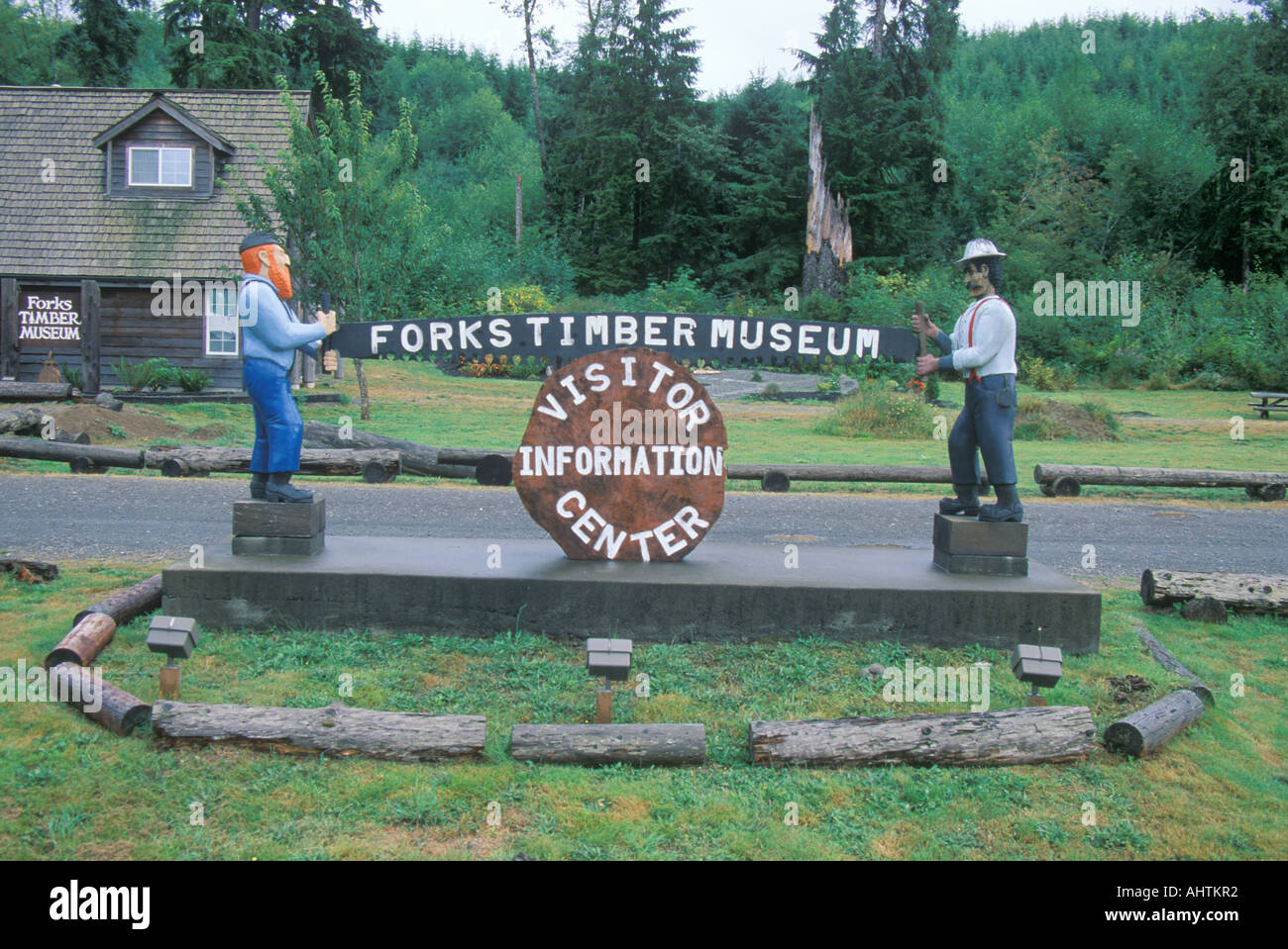 A sign that reads Forks timber museum visitor information center Stock Photo Alamy