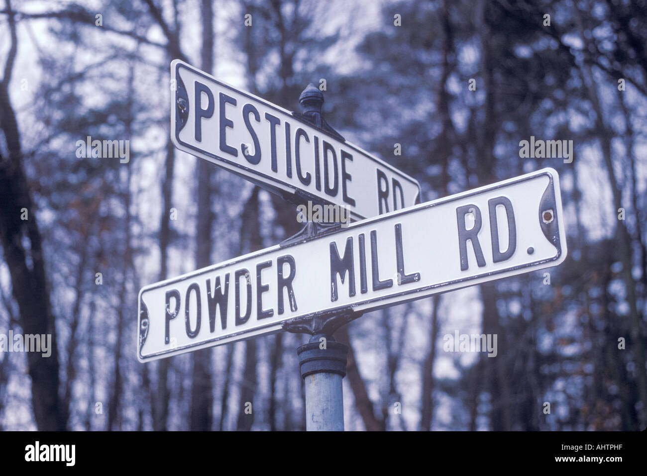 Sign that reads Powder Mill Rd and Pesticide Rd Stock Photo
