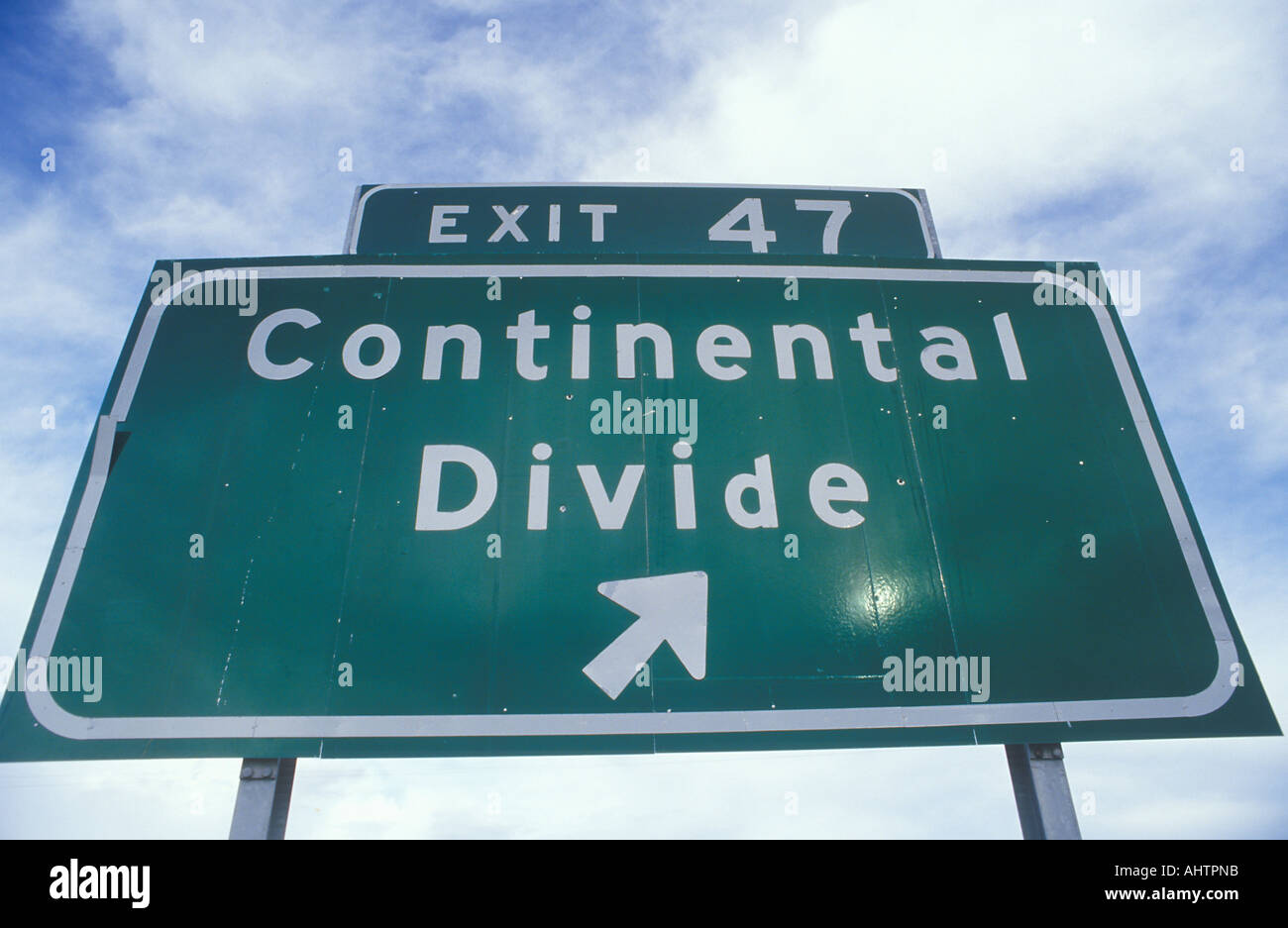 A sign that reads Continental Divide Stock Photo