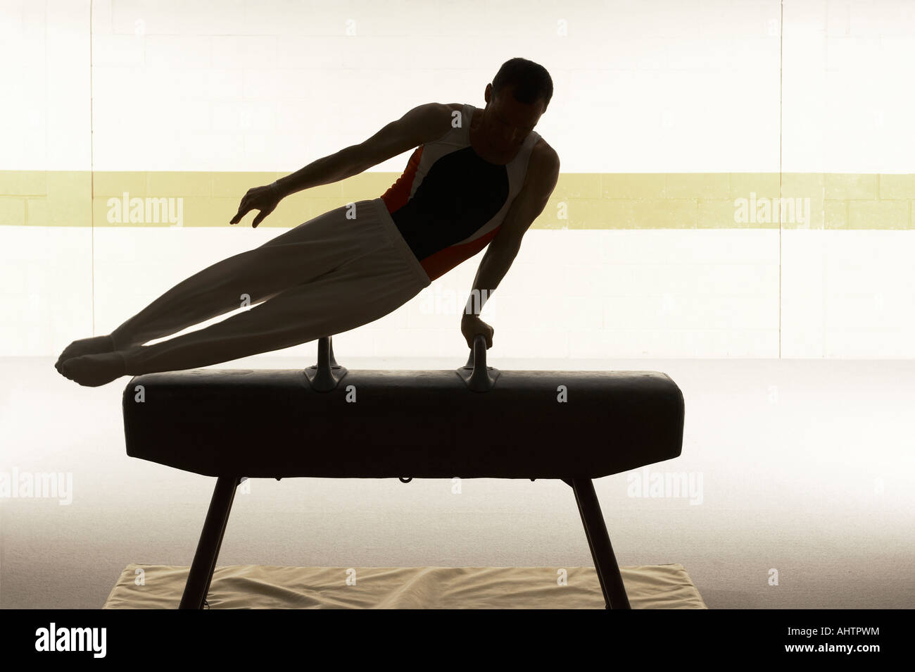 Male gymnast performing on pommel horse Stock Photo Alamy