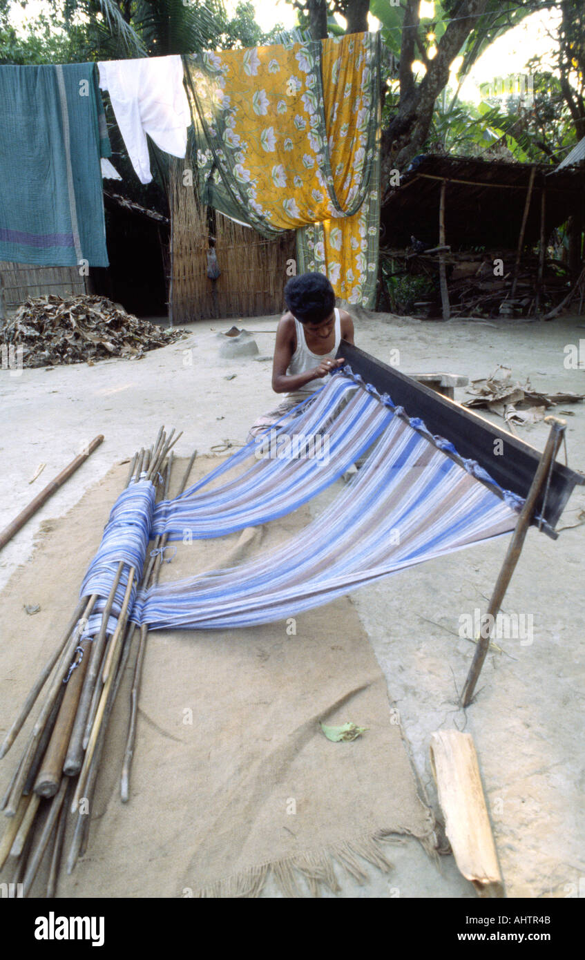 Rural weaver making a loom outside. Madaripur. Bangladesh Stock Photo