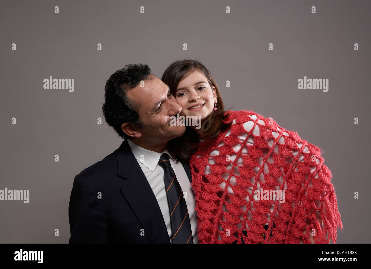 Businessman and daughter (9-11) smiling Stock Photo