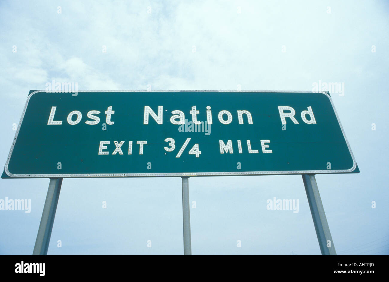 A sign that reads Lost Nation Rd Stock Photo