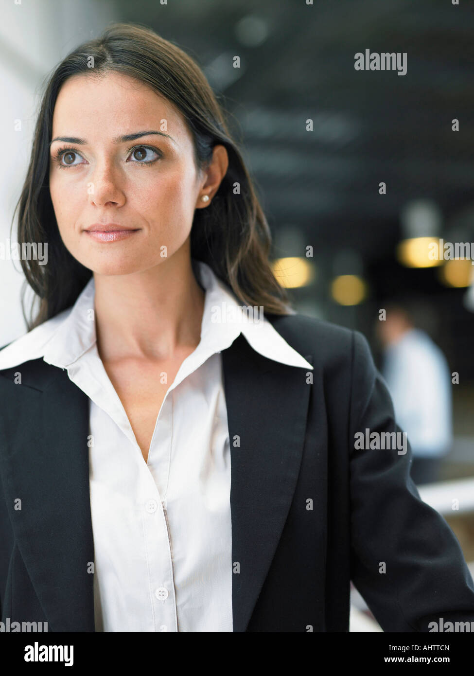 Businesswoman working in an office Stock Photo - Alamy