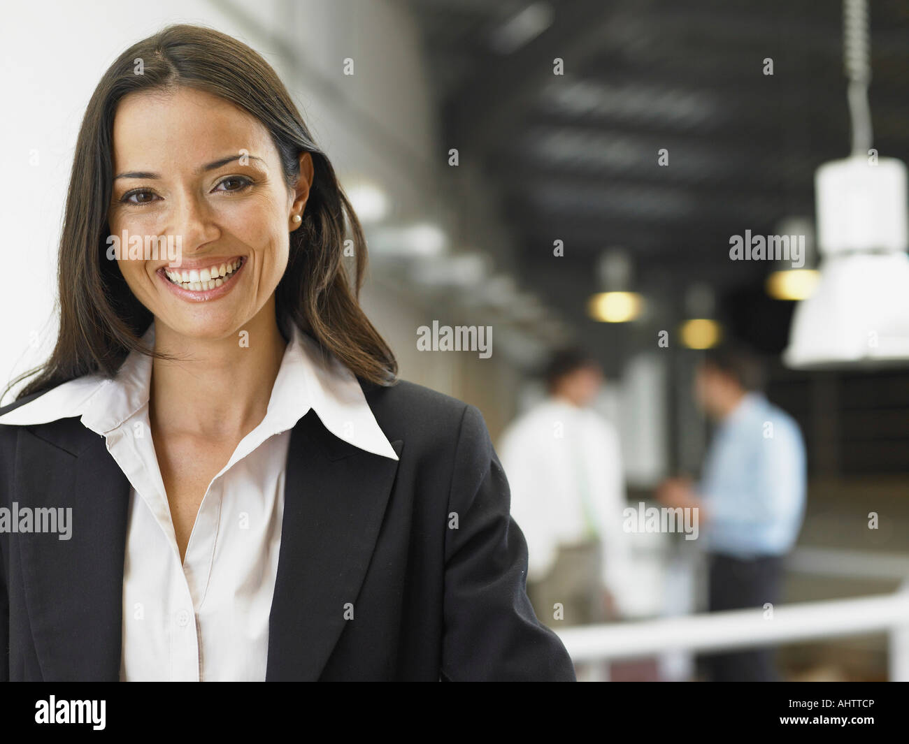 Businesswoman working in an office Stock Photo - Alamy