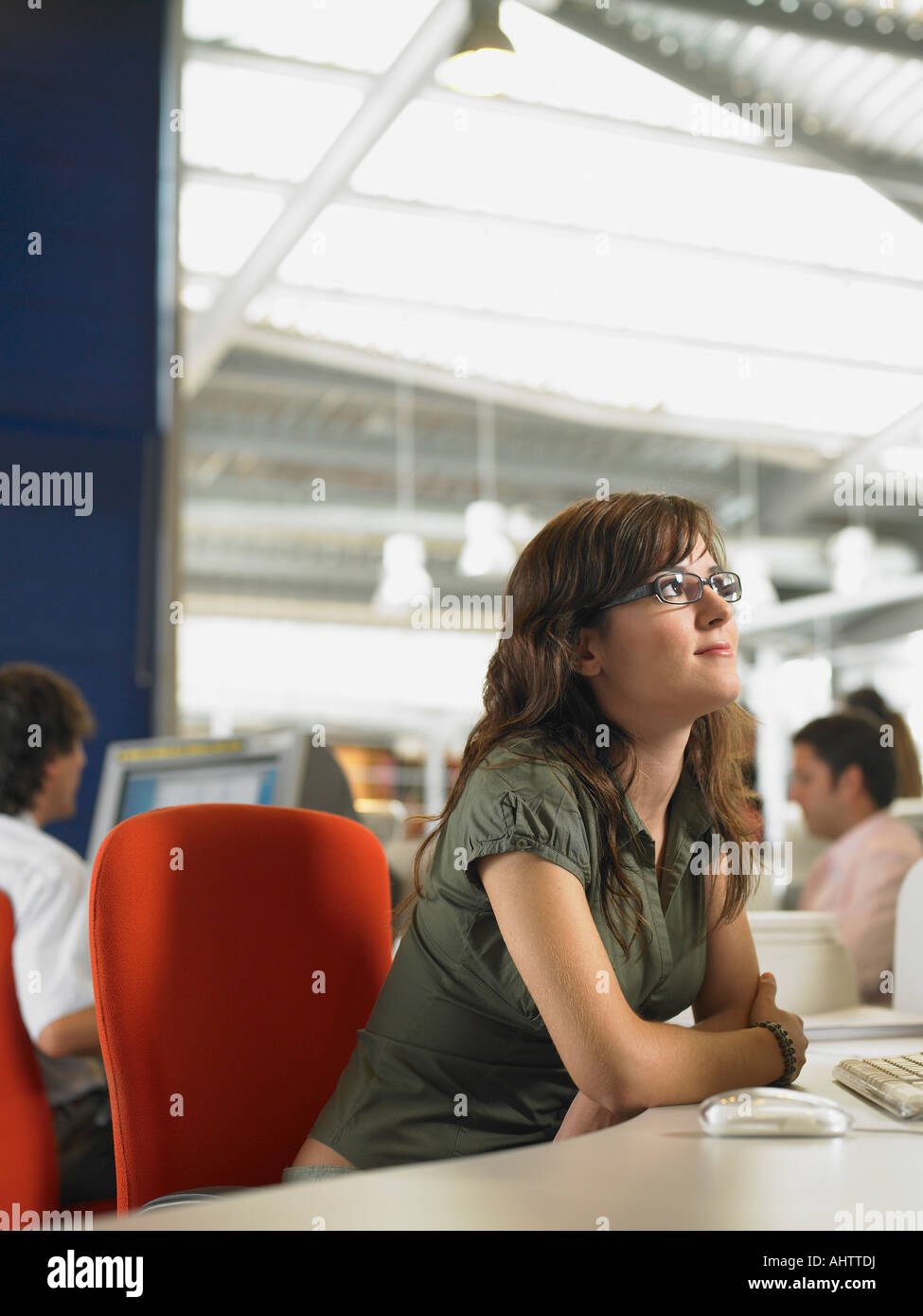 Businesswoman working in an office Stock Photo - Alamy