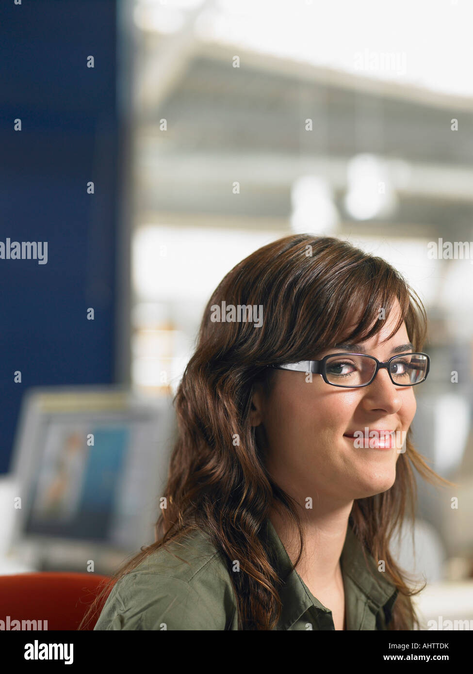 Businesswoman working in an office Stock Photo - Alamy