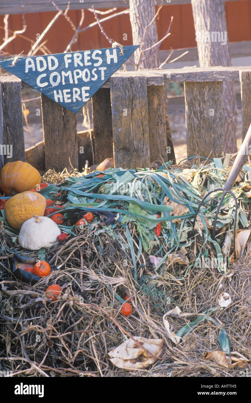 A sign that reads Add fresh compost here Stock Photo