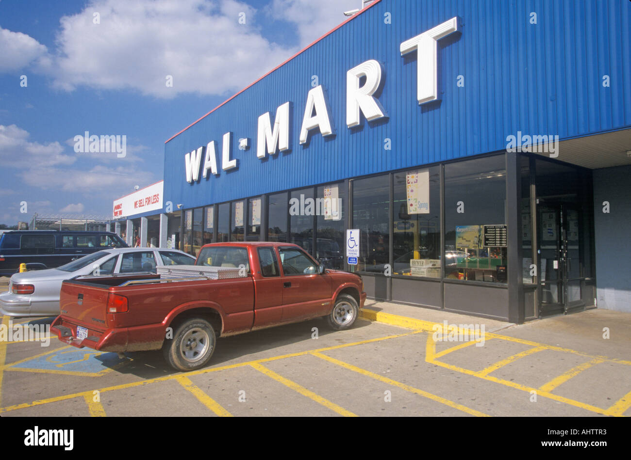 Wal Mart Supercenter Store front entrance and parking lot in Southeast