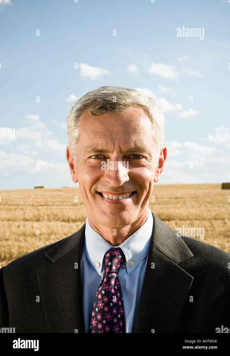 Businessman standing grain field hi-res stock photography and images ...