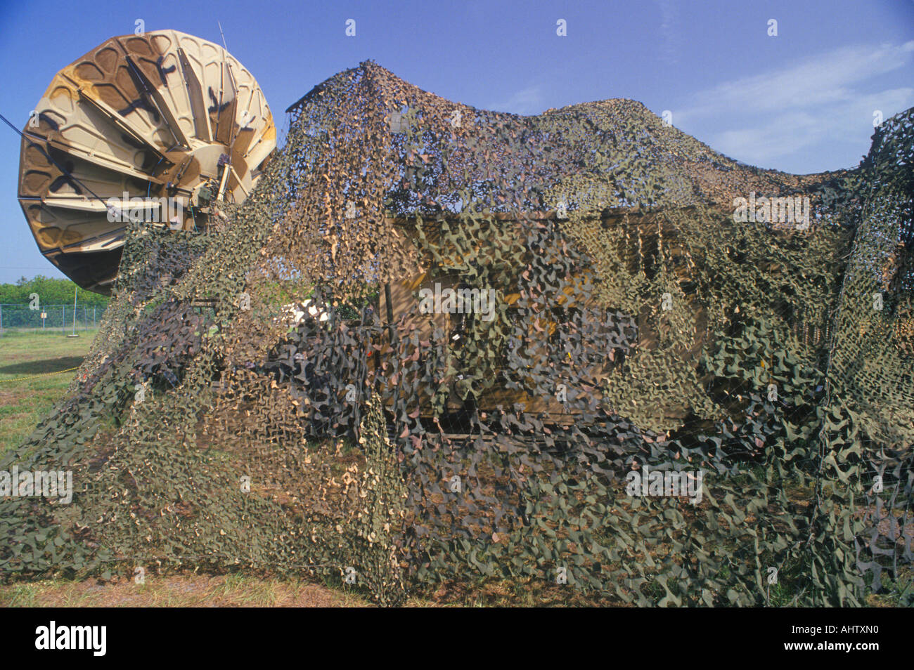 Camouflaged Tent and Satellite Stock Photo - Alamy