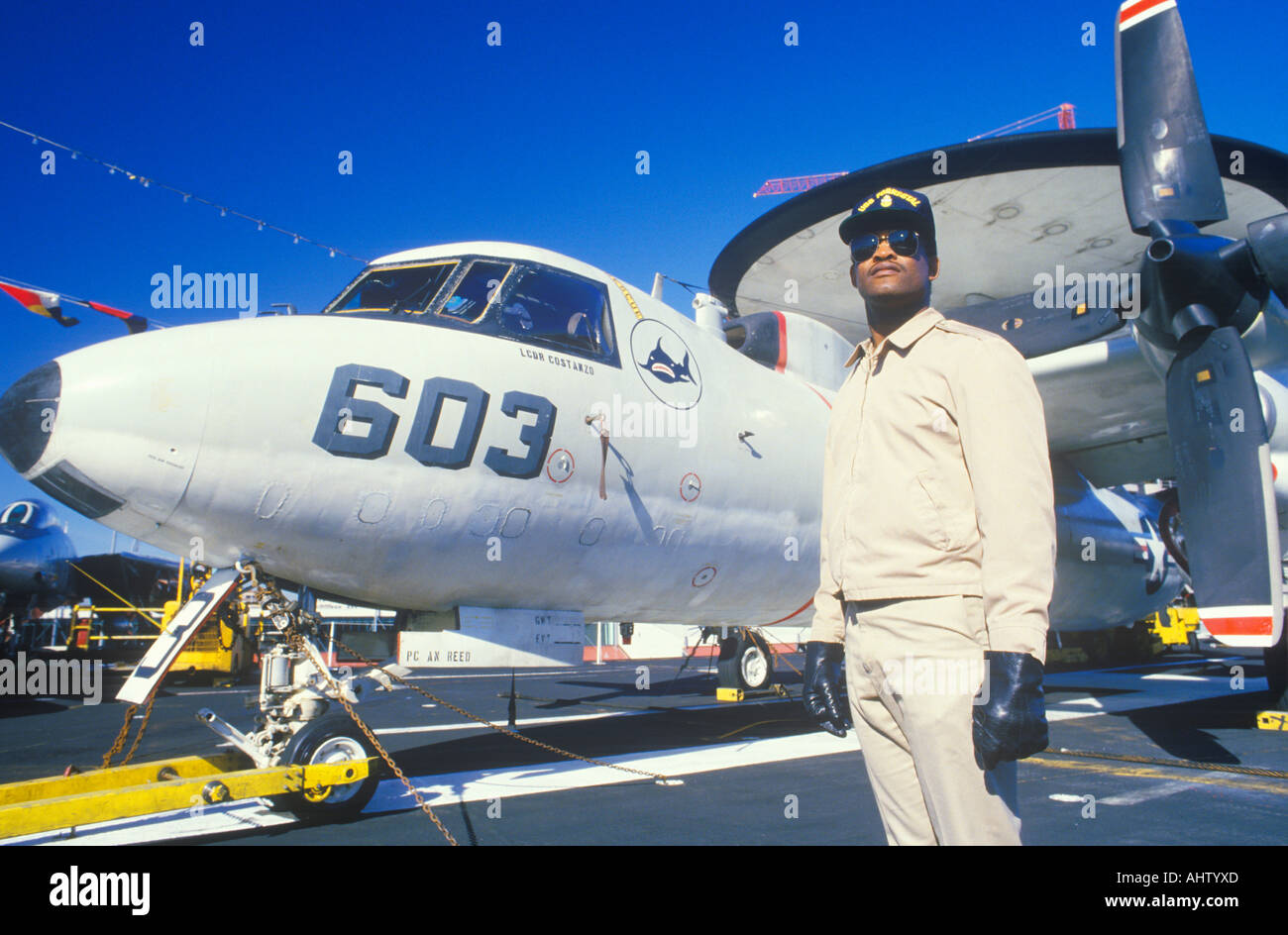 Afro American Soldier Standing By Aircraft USS Forrestal New Orleans Louisiana Stock Photo