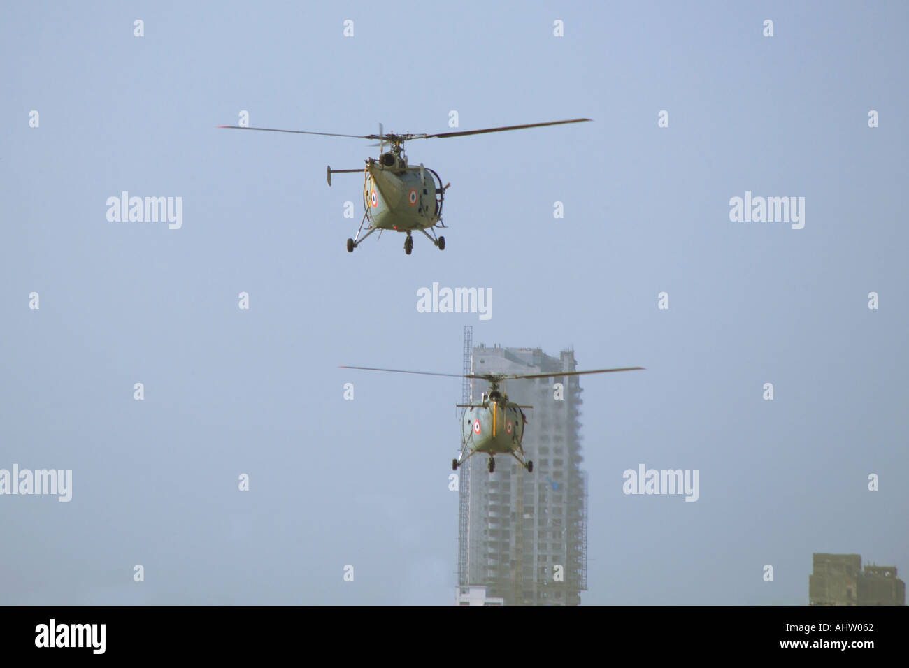 AAD 91763 Two helicopters peforming in sky during air show at Bombay now Mumbai Maharashtra India Stock Photo
