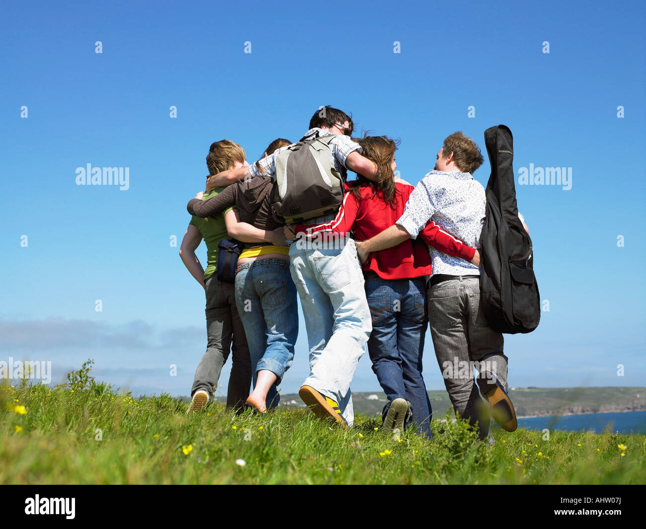 Group of young people outdoors Stock Photo - Alamy