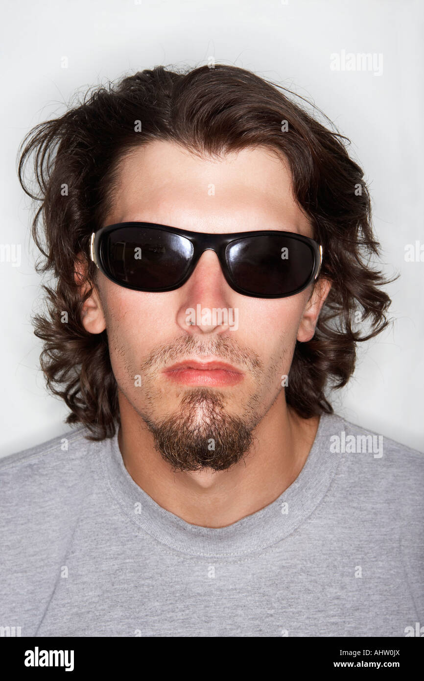 Young Male With Long Hair Wearing Sunglasses Stock Photo 14548129