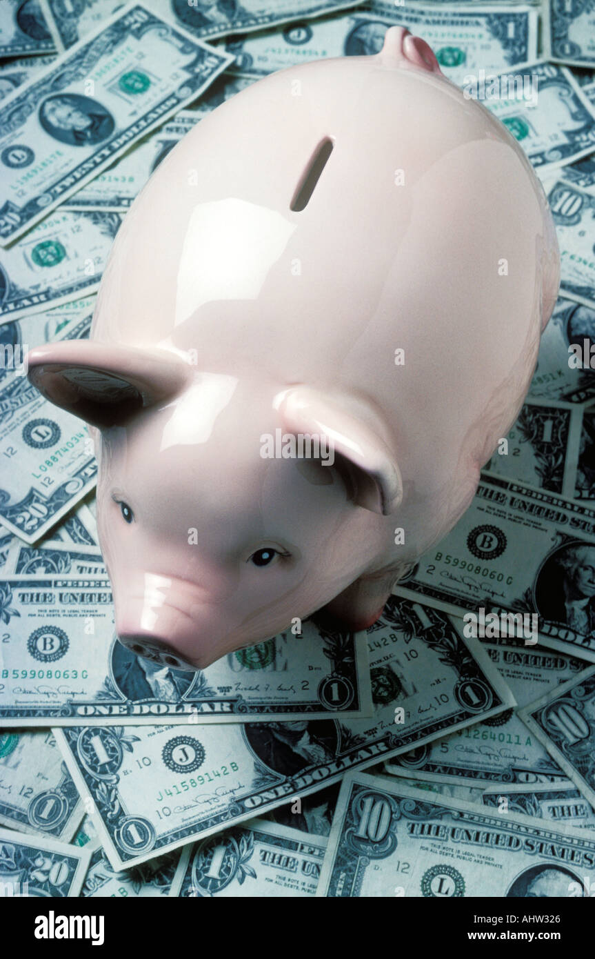 Piggy bank and USA currency Stock Photo Alamy