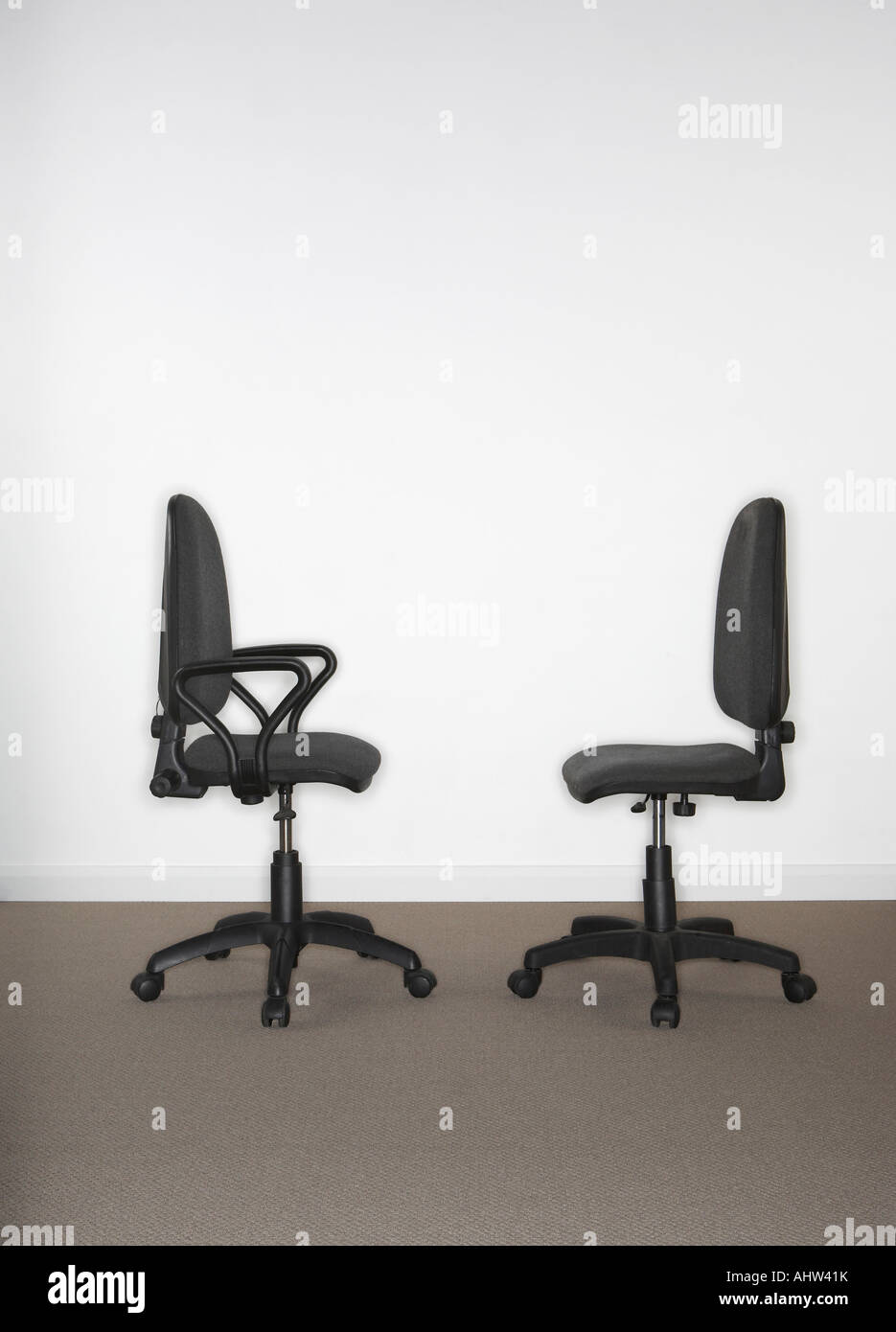 Two office chairs facing each other. Stock Photo