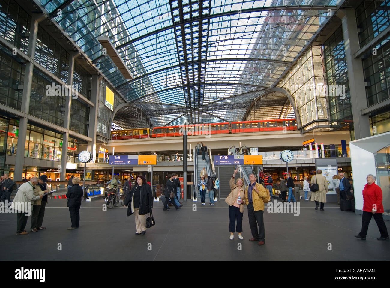 Horizontal wide angle of the busy main concourse inside Berlin Hauptbahnhof 'Berlin Central Station'. Stock Photo