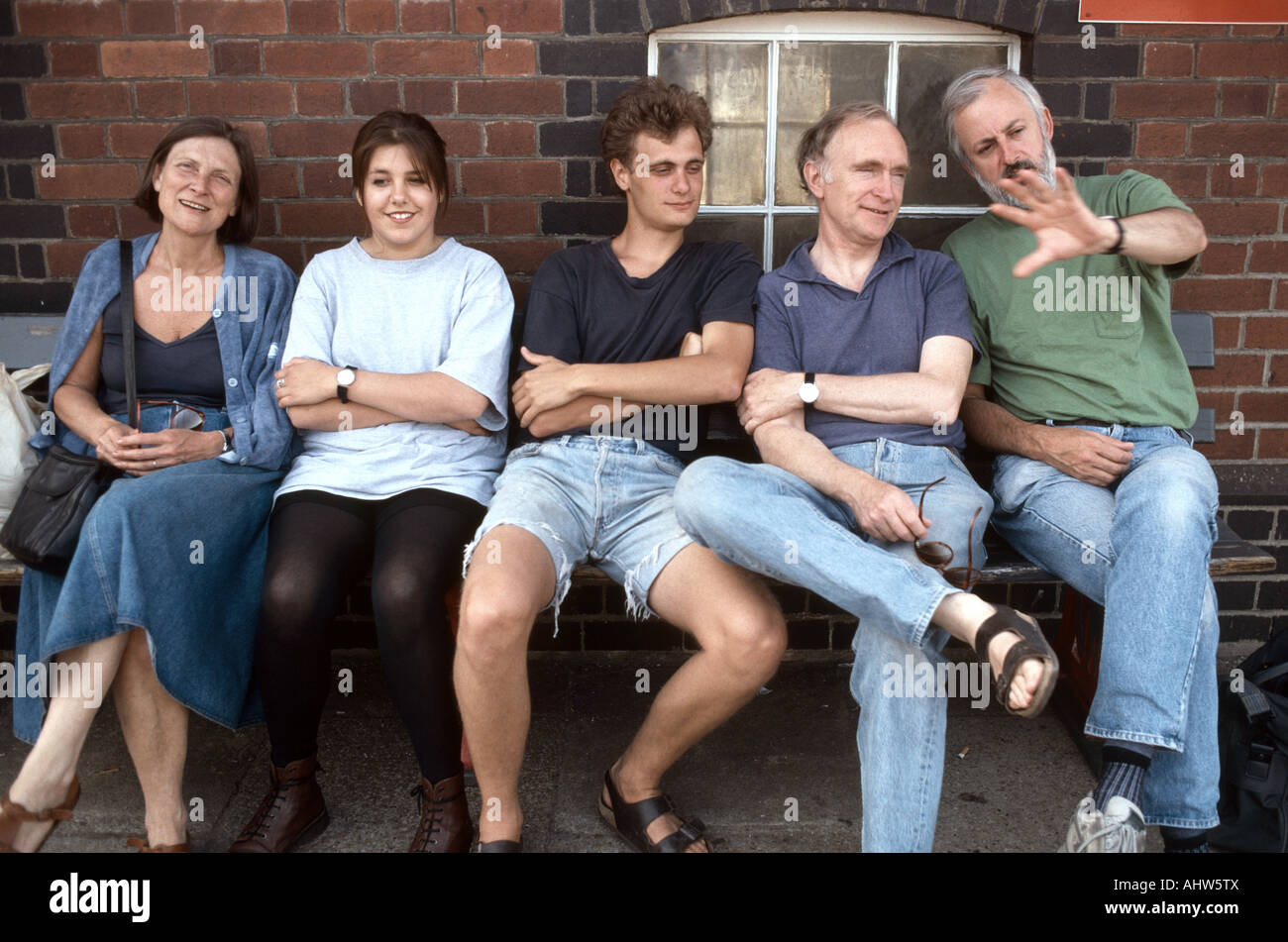 friends and family together waiting for train Stock Photo