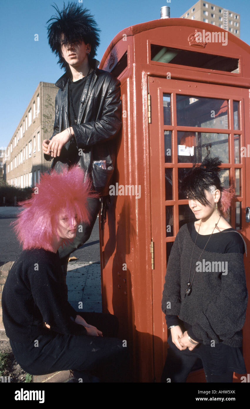 Original Punk Rockers posing in front of red phone box Stock Photo
