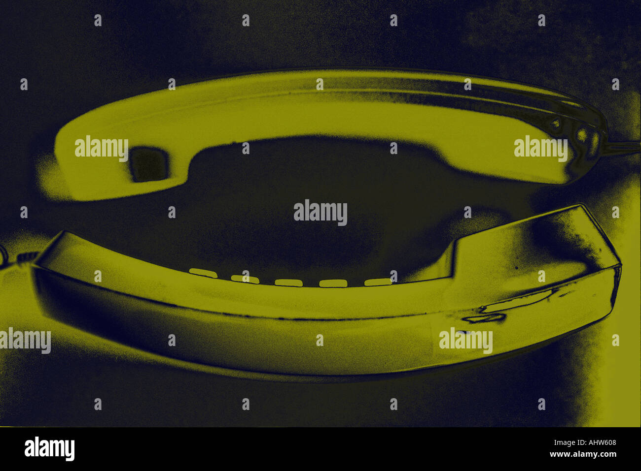 Telephone handsets solarized Stock Photo