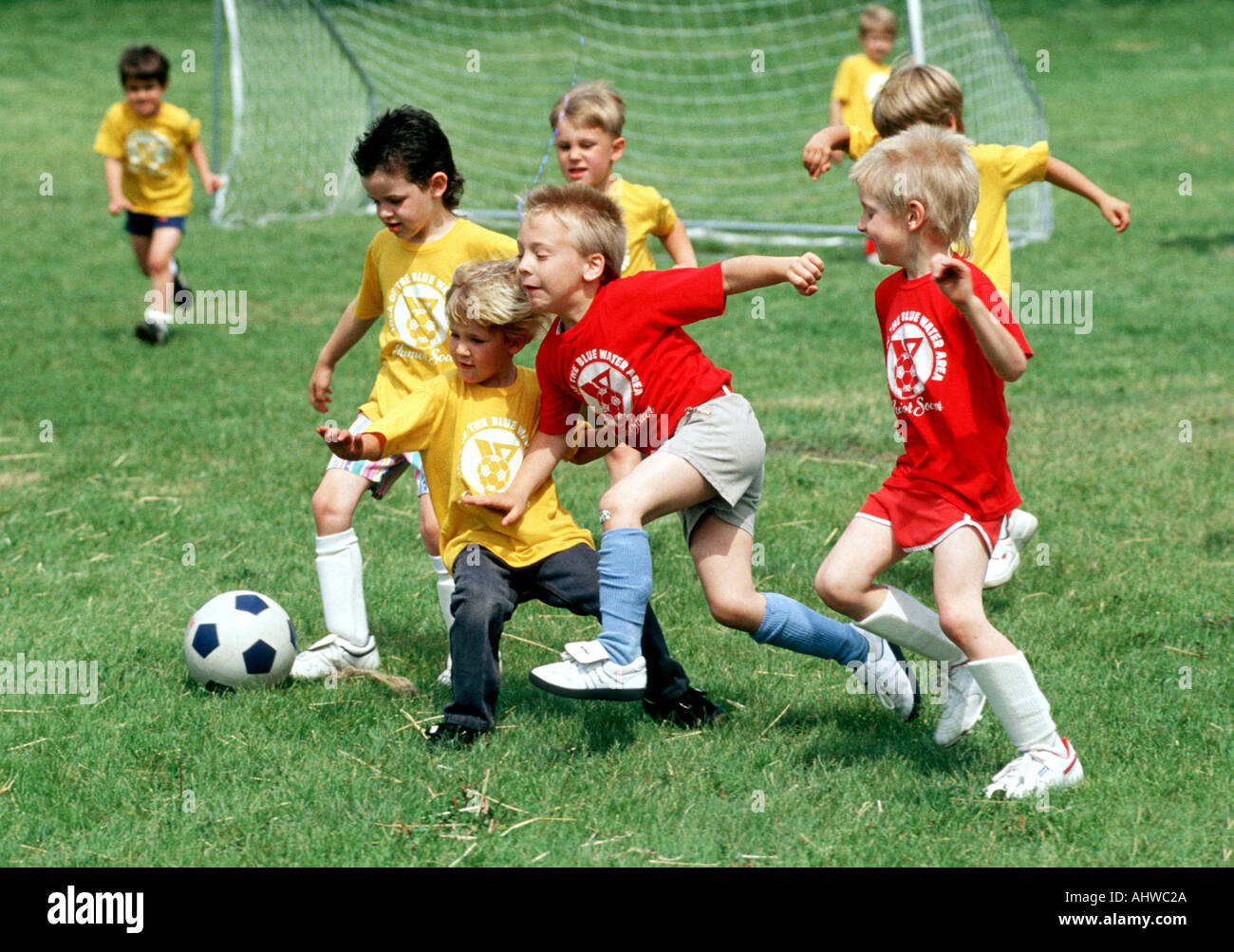 Soccer action with 5 7 year old boys Stock Photo