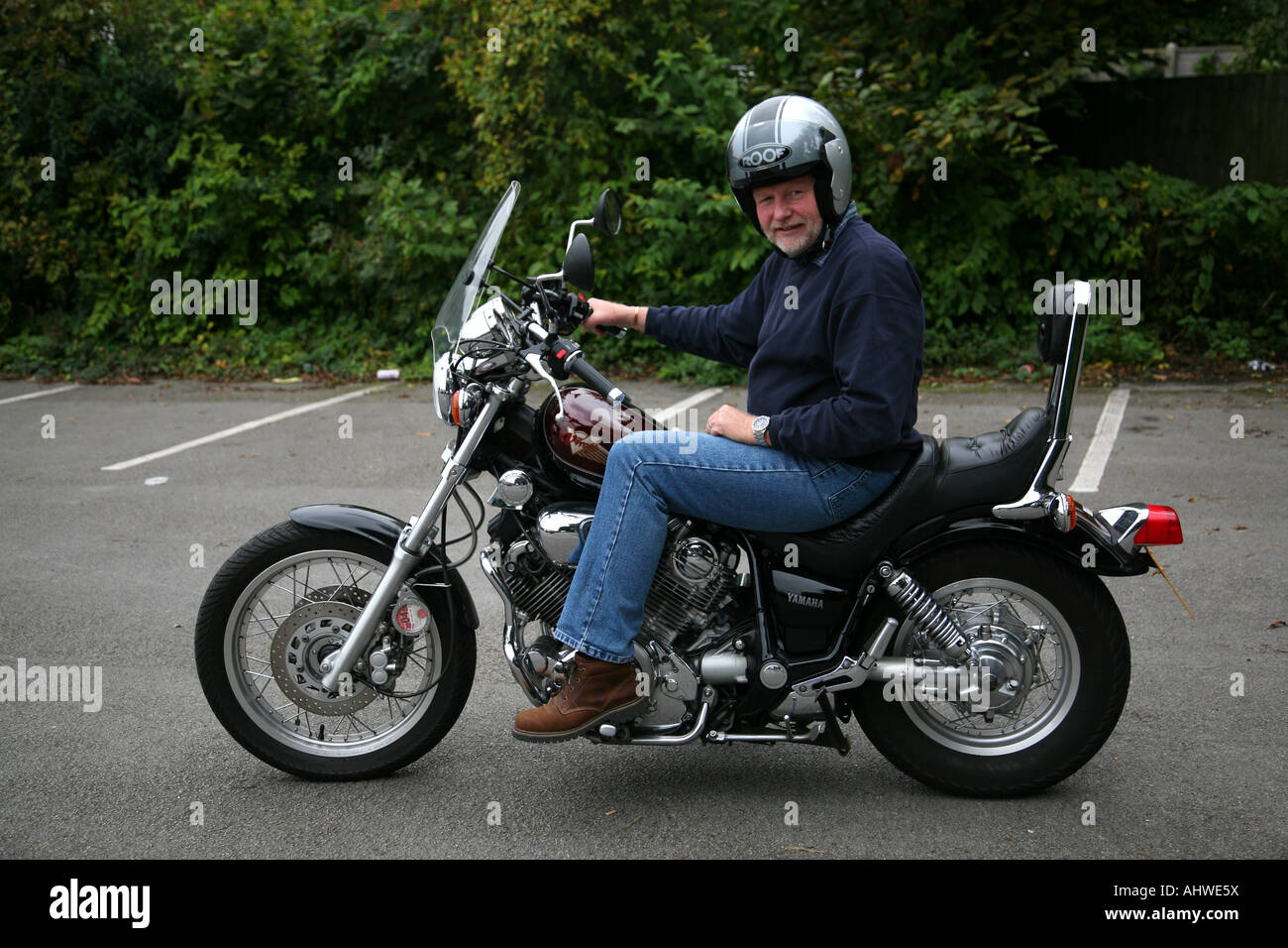Man riding a Yamaha Virago 1100 Motorcycle. Stock Photo