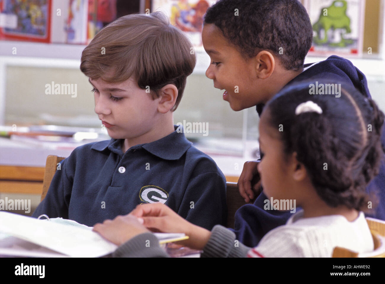 African American Latino Caucasian students in class Stock Photo