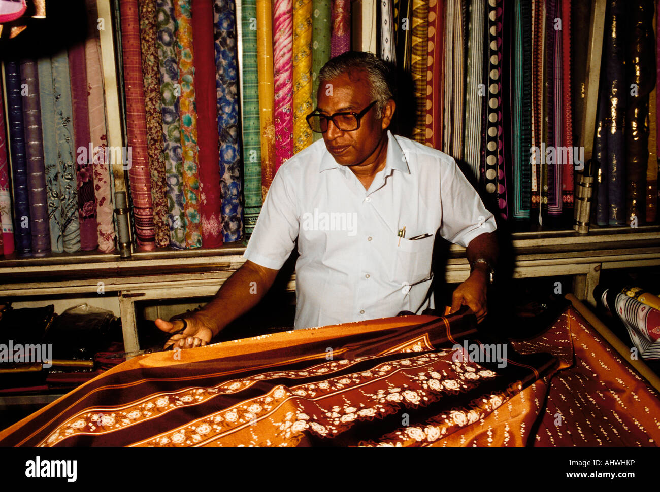 1, one, Singaporean, Indian man, merchant, selling silk fabric, silk fabric, silk fabrics