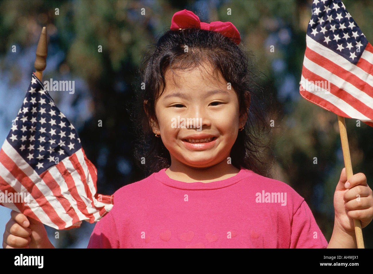 Asian girl holding american flags hi-res stock photography and images ...
