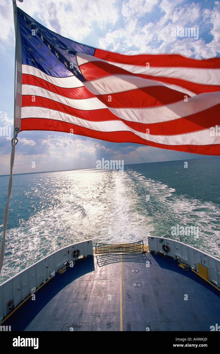 American flag waving on ship hires stock photography and images Alamy