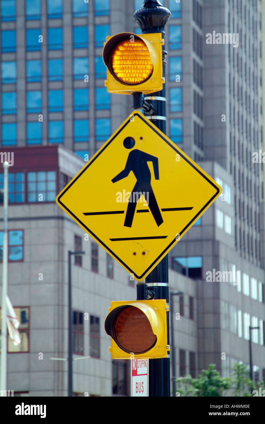 Street sign warning drivers of pedestrian traffic Stock Photo