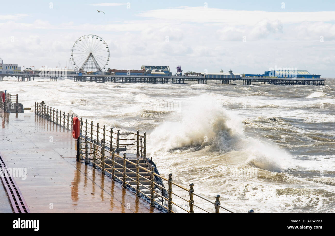 Waves break over seawall during stormy weather at Blackpool,UK Stock