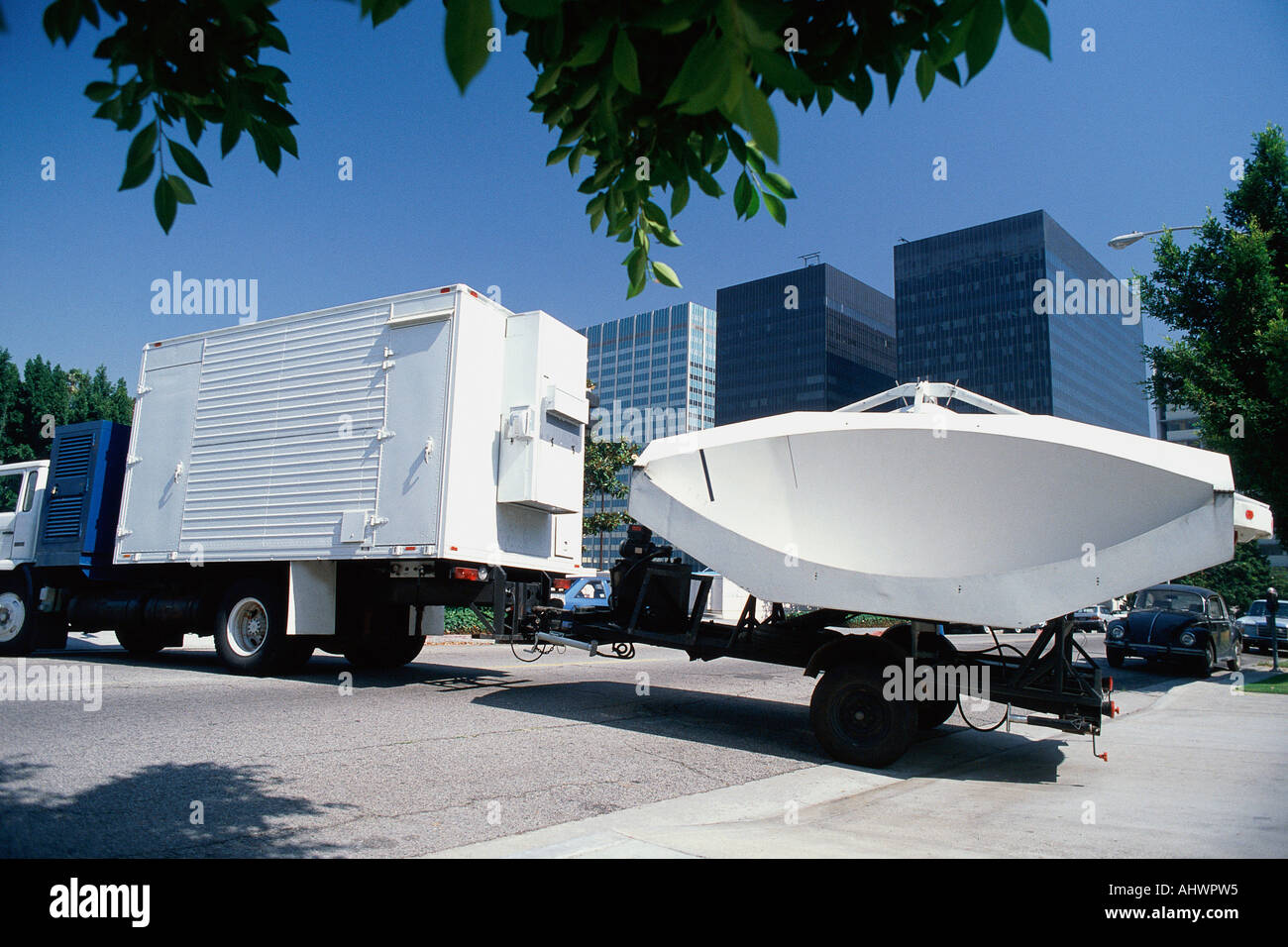 Truck hauling array satellite dish Stock Photo Alamy