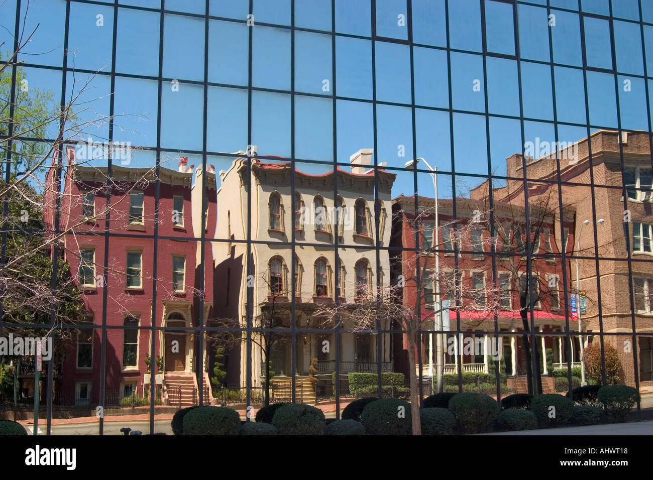 Reflections of old buildings in modern glass building VCU Health System ...