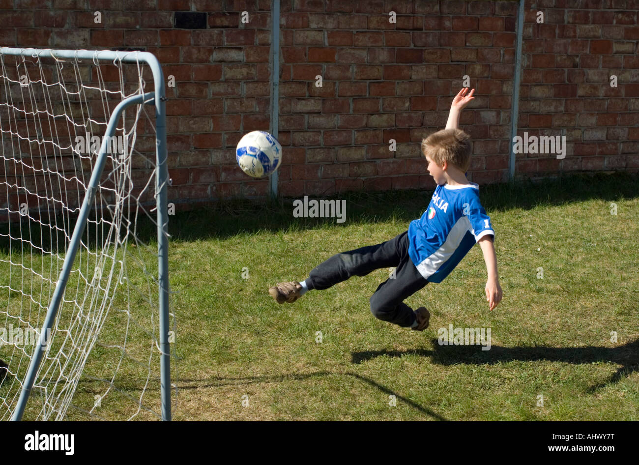 shot on goal scissor kick Stock Photo Alamy