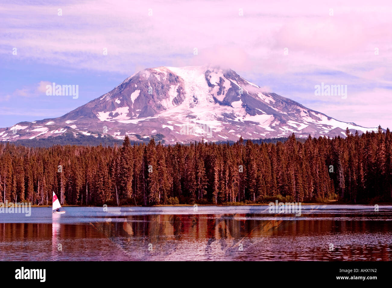 Image of Mt Adams and its reflection in Takhlakh Lake near sunset with ...