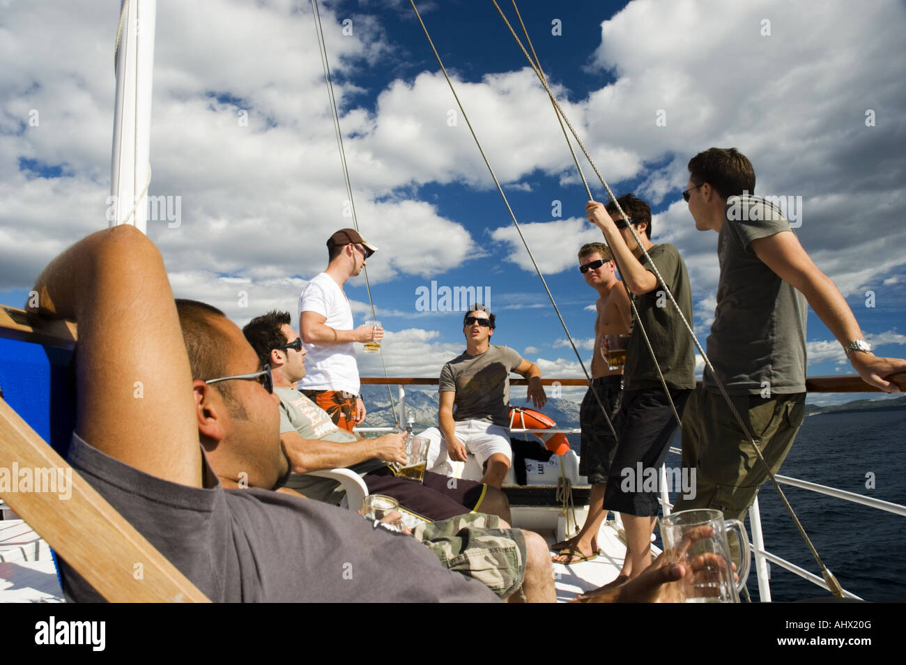 Holidayers enjoy the Croatian sunshine aboard the Penelopa motor cruiser during a Sail Croatia trip. Stock Photo