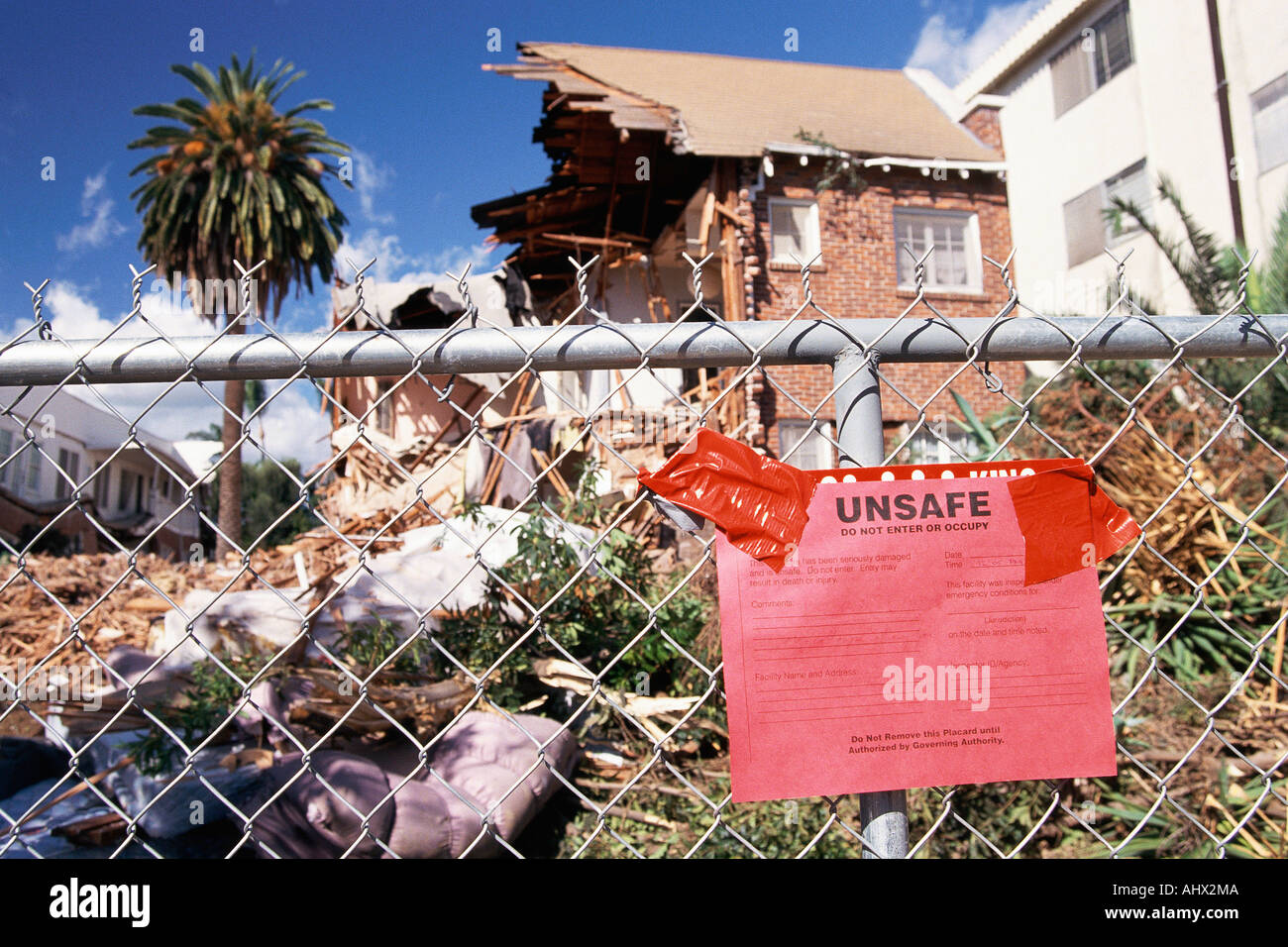 Condemned house destroyed by natural disaster Stock Photo