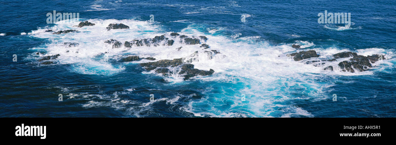 Ocean waves crashing on rocks California Stock Photo