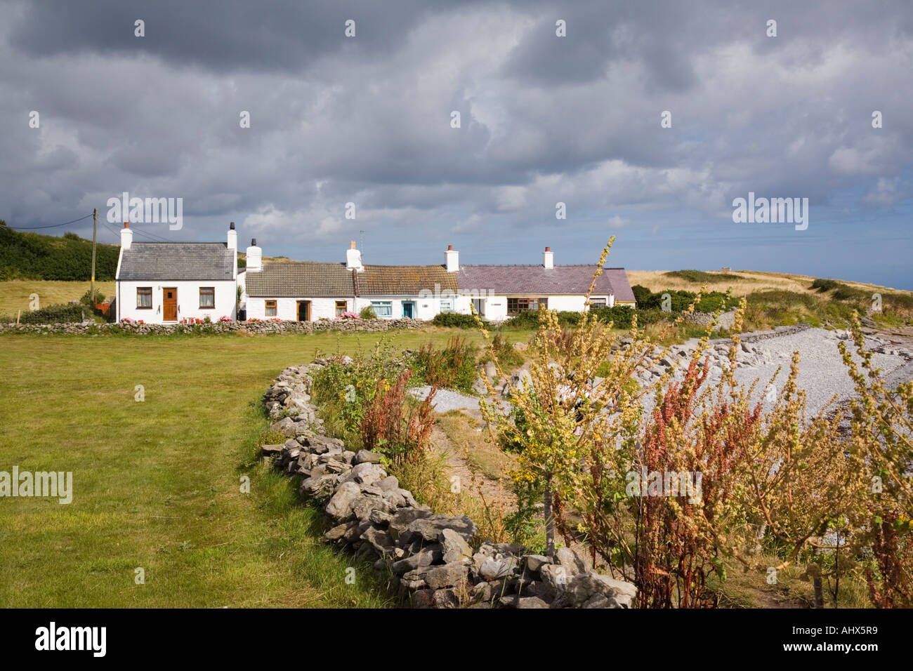 Row Of White Fishermen S Cottages Beside Isle Of Anglesey Coastal