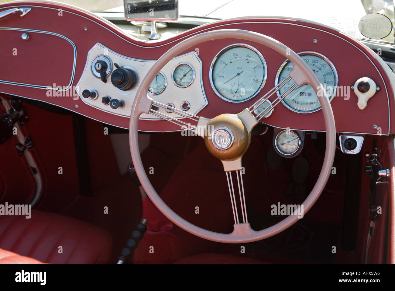 Classic 1929 Humber 9 28 MG  open top sports car dashboard with gauges and steering wheel white bodywork with red trim Stock Photo