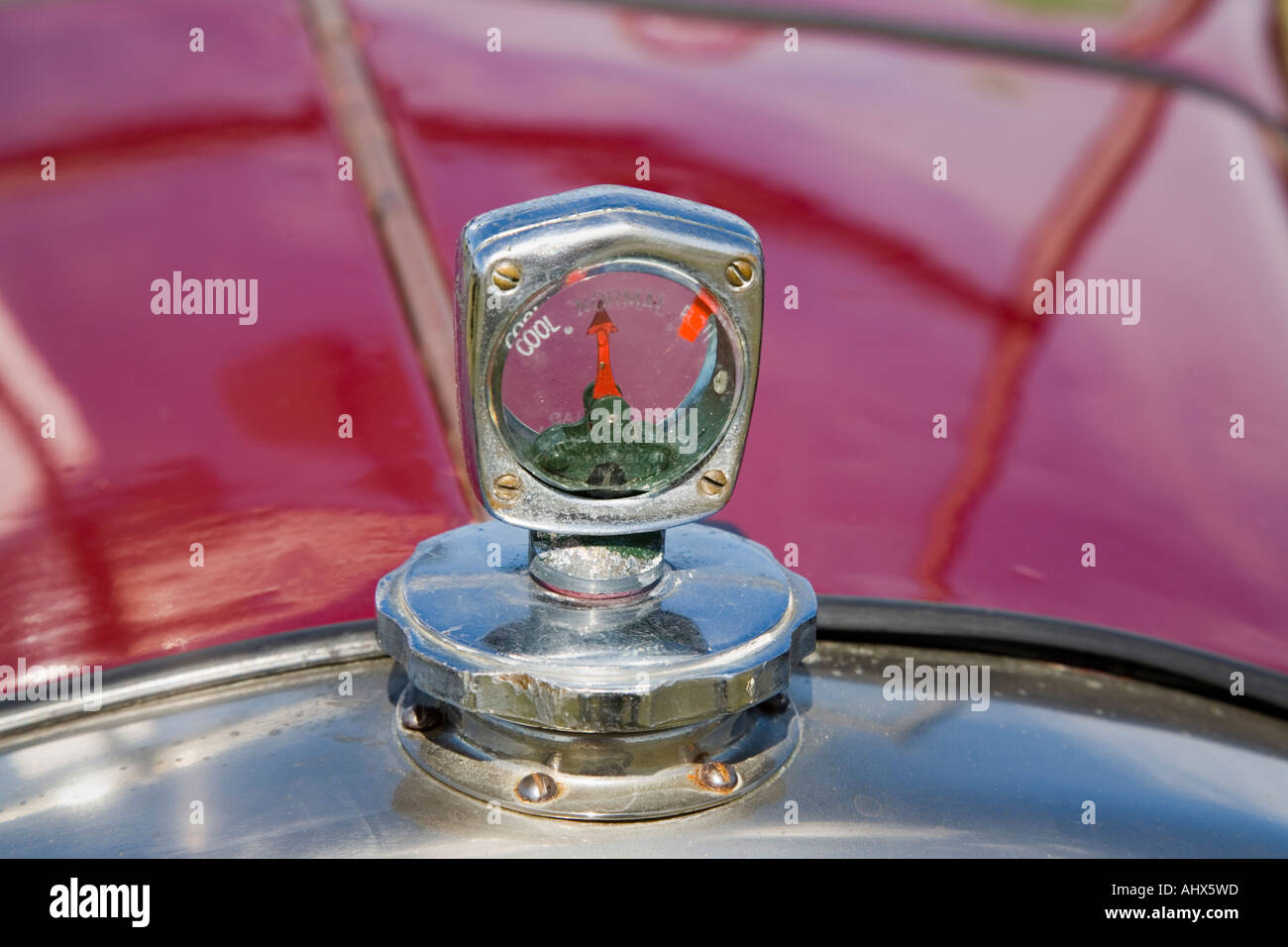 Wilmot Breeden calorimeter or temperature gauge in close up on red