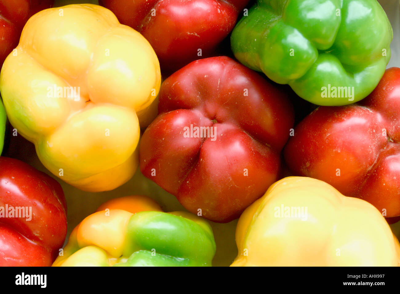 Mixed red yellow and green peppers Stock Photo